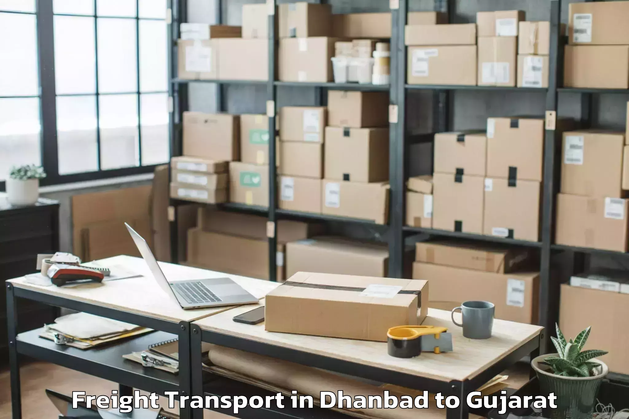 Easy Dhanbad to Rai University Ahmedabad Freight Transport Booking